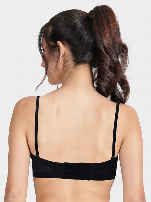 Shyaway model back view wearing black balconette bra with adjustable straps and hook and eye closure