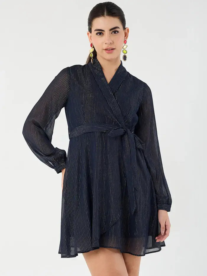 Femella navy belted mini dress with long sleeves and a wrap front design