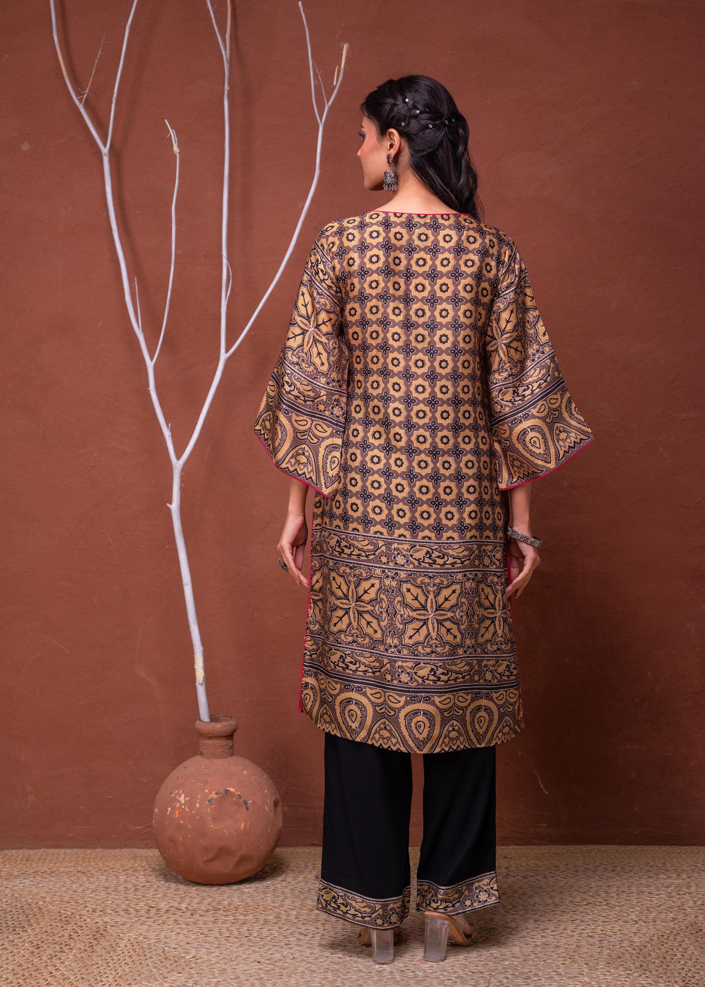Juniper mustard embroidered kurta pant set back view on model featuring intricate geometric and floral motifs with black pants