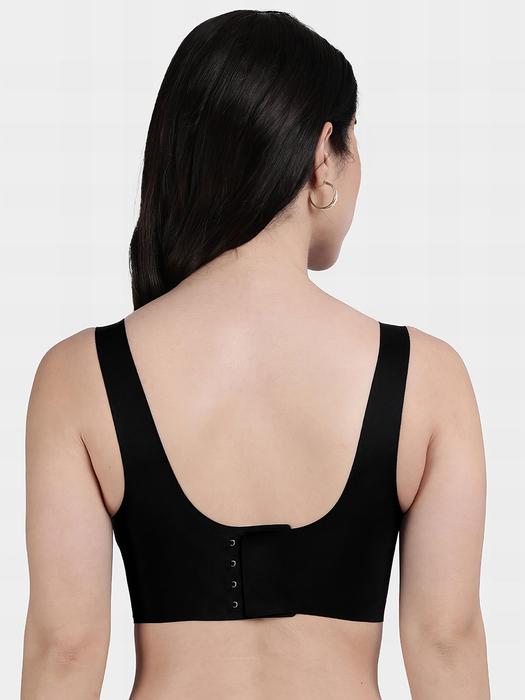 Shyaway black front hook seamless bra shown from back on model with wide straps and smooth coverage