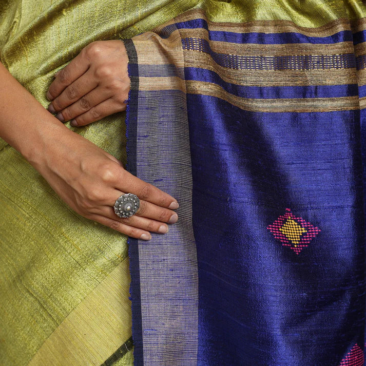 Plumvera green Tussar silk Bhagalpuri saree with contrasting blue pallu hand embroidery and silver ring accent