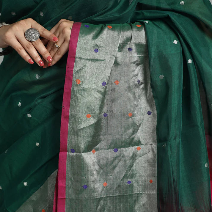 Plumvera Venkatagiri silk cotton saree deep green body with silver zari pallu multicolor butis and magenta border