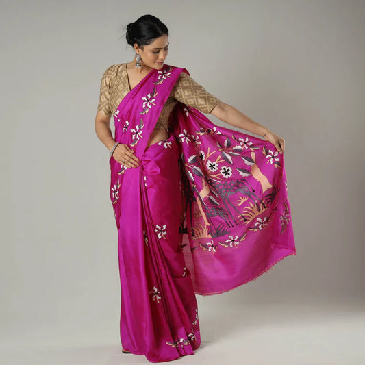 Plumvera Bengal Kantha embroidery silk saree magenta with floral and bird motifs gold blouse model holding pallu