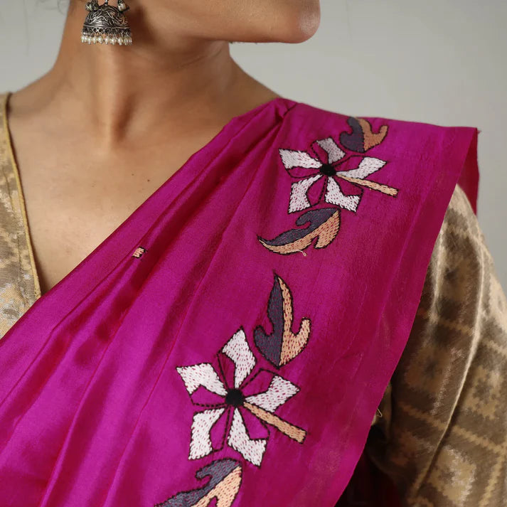 Plumvera magenta silk pallu with floral hand embroidery and silver jhumka on model wearing Bengal Kantha embroidery silk saree