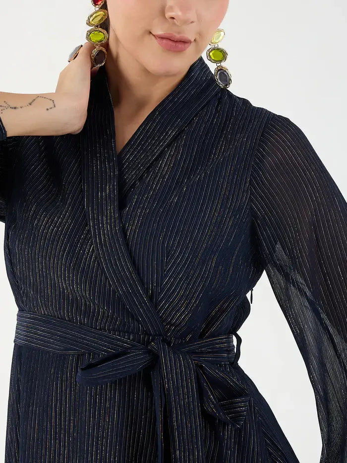 Close-up of Femella navy belted mini dress with subtle metallic stripes and long sleeves
