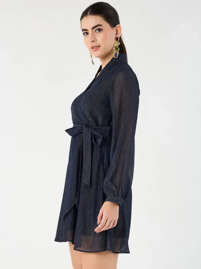 Femella navy belted mini dress with long sheer sleeves and a tied waist belt