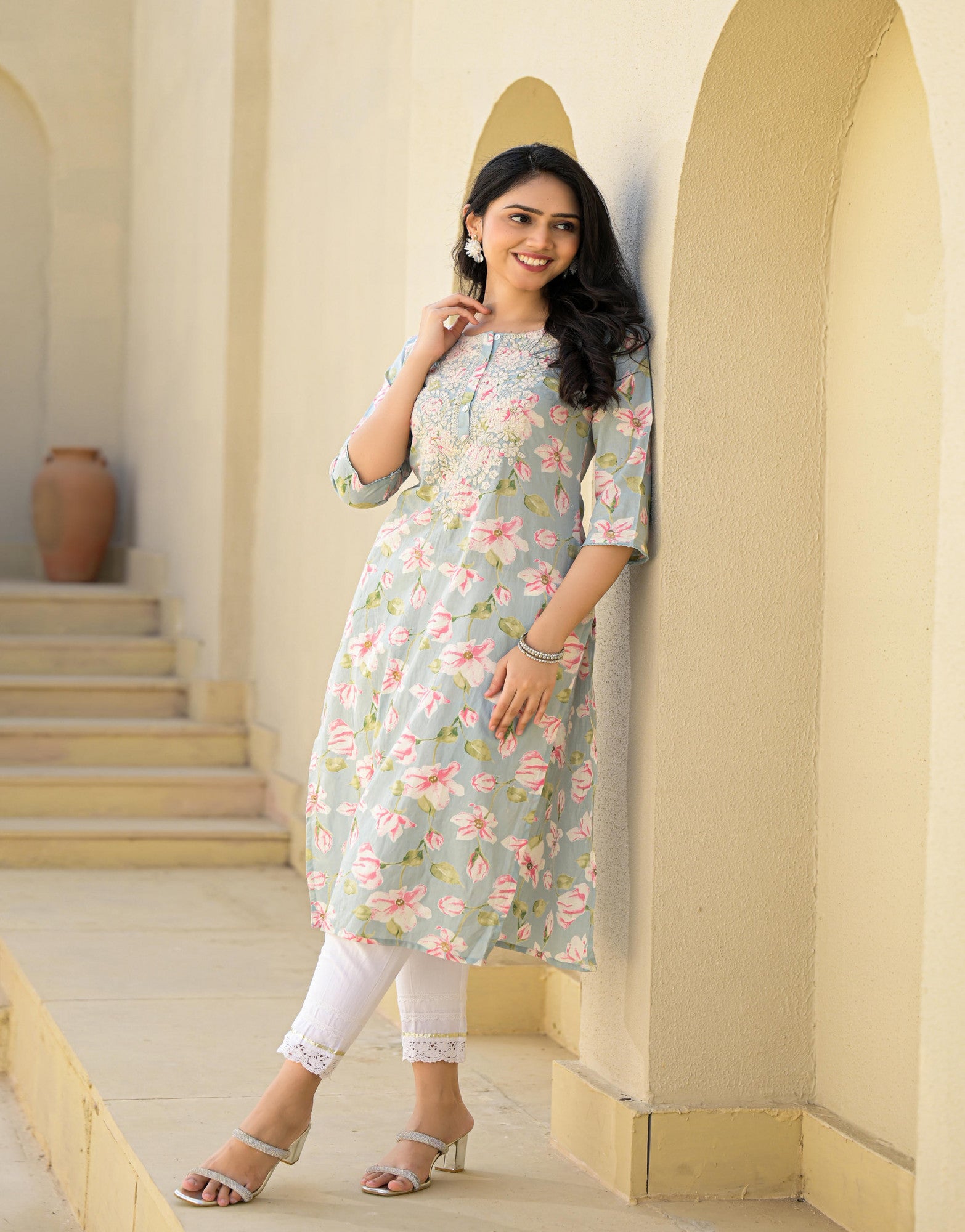 Juniper model wearing green floral cotton kurta with three quarter sleeves and white leggings